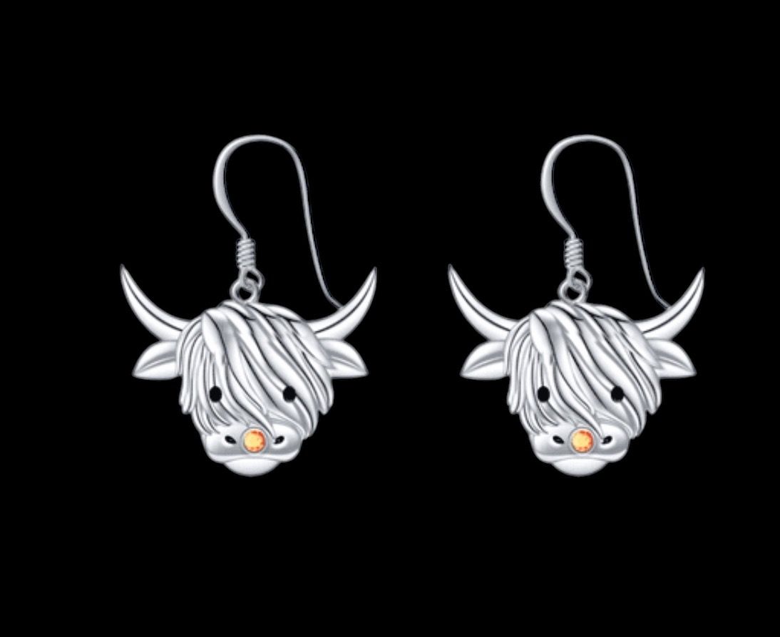 Scottish Highland Cow Earrings Sterling silver Scottish Highland Cow earrings, handcrafted Scottish jewelry gift, made in Scotland, shown on black
