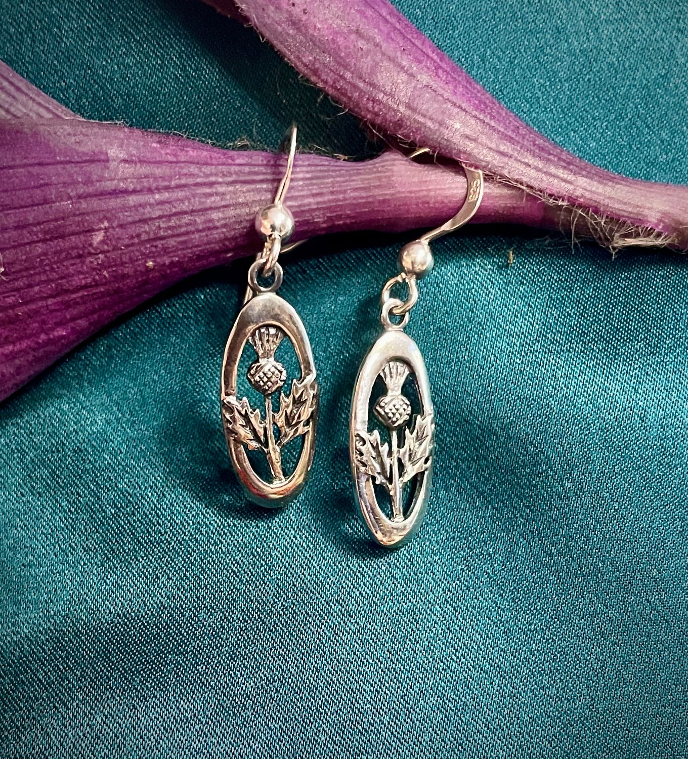 Celtic Thistle Earrings - McKenzie Elegant sterling silver oval thistle earrings on purple leaf, Scottish heritage jewelry for her