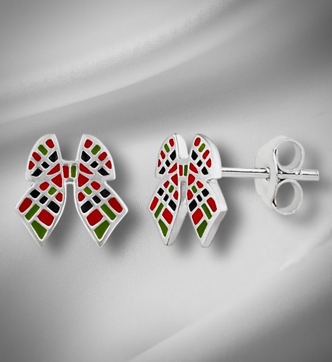 Scottish Tartan Silver Stud Earrings Sterling silver earrings featuring a detailed Scottish tartan pattern.