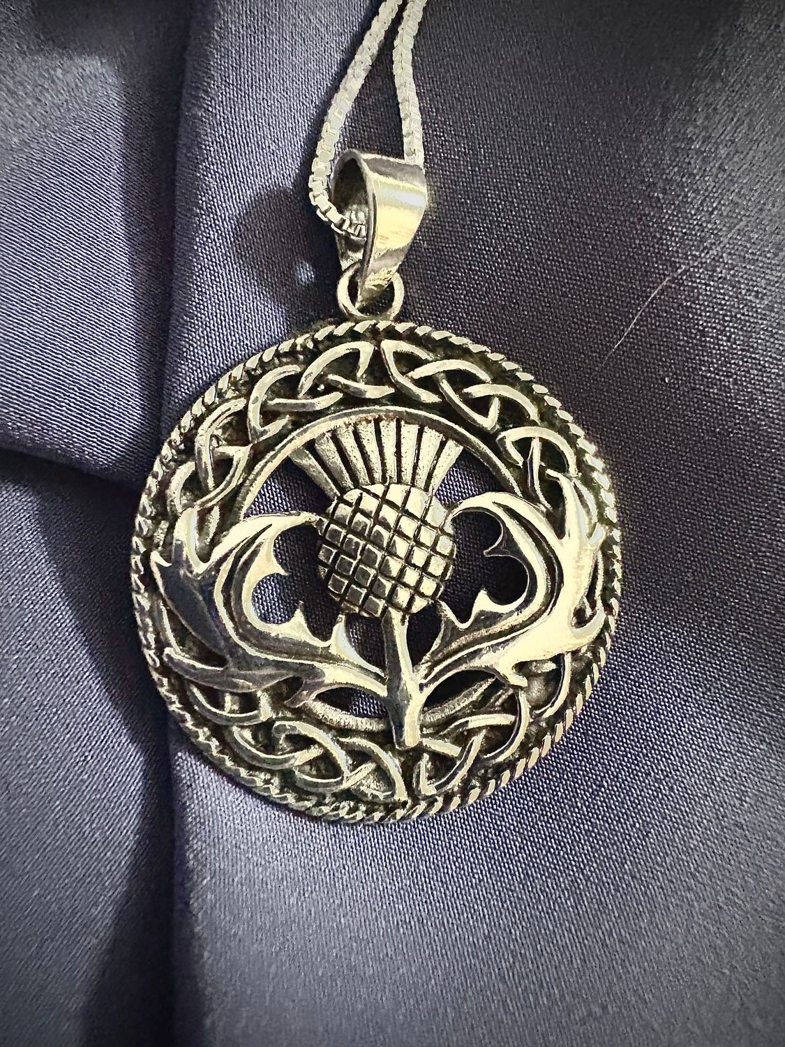 Sterling silver Scottish thistle pendant necklace in .925 silver, symbolizing Scottish heritage and pride.