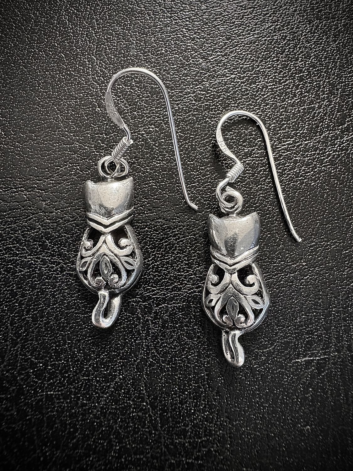 Treasured Celtic Cat Silver Earrings Sterling Silver Celtic Knot Cat Earrings on Black Background.