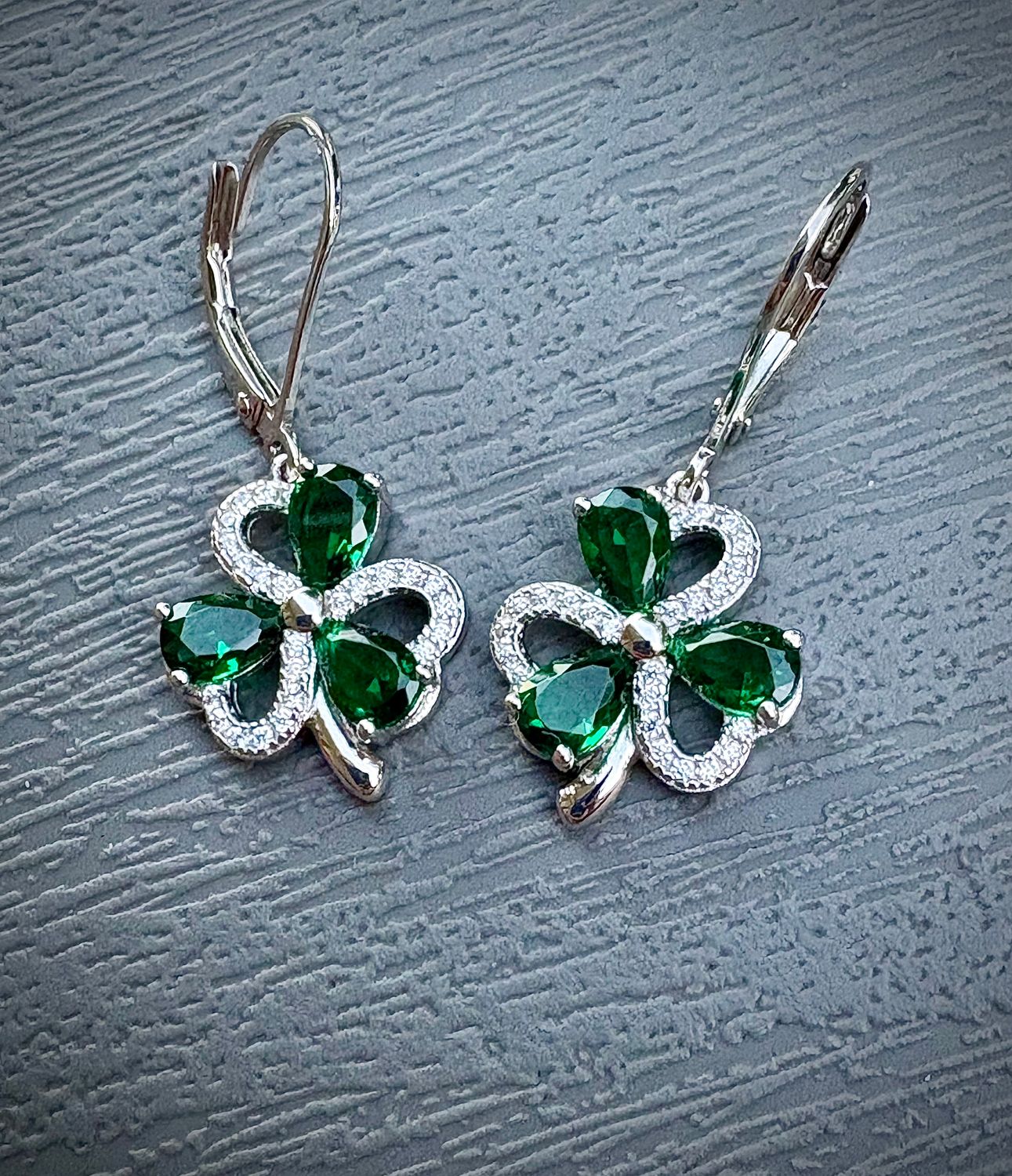Silver Stone Set Irish Shamrock Earrings Sterling Silver and Cubic Zirconia Irish Shamrock Earrings with Lever Backs on Grey Background.
